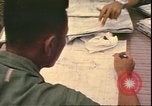 Image of Vietnamese officer Vietnam, 1970, second 33 stock footage video 65675058214