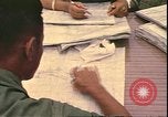Image of Vietnamese officer Vietnam, 1970, second 36 stock footage video 65675058214