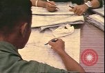 Image of Vietnamese officer Vietnam, 1970, second 38 stock footage video 65675058214
