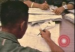 Image of Vietnamese officer Vietnam, 1970, second 42 stock footage video 65675058214