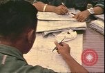 Image of Vietnamese officer Vietnam, 1970, second 43 stock footage video 65675058214