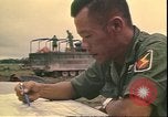 Image of Vietnamese officer Vietnam, 1970, second 44 stock footage video 65675058214