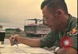Image of Vietnamese officer Vietnam, 1970, second 49 stock footage video 65675058214