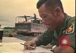 Image of Vietnamese officer Vietnam, 1970, second 54 stock footage video 65675058214