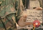 Image of Vietnamese officer Vietnam, 1970, second 57 stock footage video 65675058214