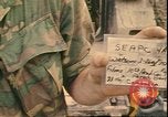 Image of Vietnamese officer Vietnam, 1970, second 58 stock footage video 65675058214