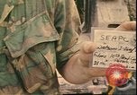 Image of Vietnamese officer Vietnam, 1970, second 60 stock footage video 65675058214