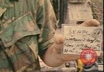 Image of Vietnamese officer Vietnam, 1970, second 62 stock footage video 65675058214