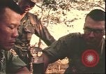 Image of American officer Vietnam, 1970, second 55 stock footage video 65675058219