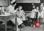 Image of African American citizens in Great Depression United States USA, 1937, second 21 stock footage video 65675058300