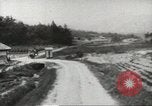 Immagine di MacArthur lo sbarco a Pusan con le truppe degli Stati Uniti Corea, 1951, secondo 16 filmato di repertorio 65675058357