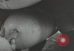Image of World War 2 operations aboard USS Independence CVL-22 Pacific Theater, 1943, second 27 stock footage video 65675058372