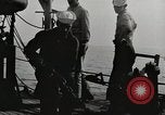Image of planes dive bombing beach Pacific Theater, 1943, second 5 stock footage video 65675058376