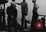 Image of planes dive bombing beach Pacific Theater, 1943, second 6 stock footage video 65675058376