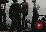 Image of planes dive bombing beach Pacific Theater, 1943, second 7 stock footage video 65675058376