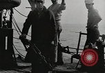 Image of planes dive bombing beach Pacific Theater, 1943, second 10 stock footage video 65675058376