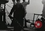 Image of planes dive bombing beach Pacific Theater, 1943, second 11 stock footage video 65675058376