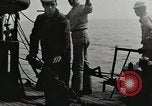Image of planes dive bombing beach Pacific Theater, 1943, second 15 stock footage video 65675058376