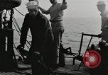 Image of planes dive bombing beach Pacific Theater, 1943, second 17 stock footage video 65675058376