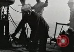 Image of planes dive bombing beach Pacific Theater, 1943, second 19 stock footage video 65675058376