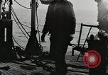 Image of planes dive bombing beach Pacific Theater, 1943, second 27 stock footage video 65675058376