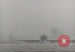 Image of planes dive bombing beach Pacific Theater, 1943, second 29 stock footage video 65675058376