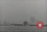 Image of planes dive bombing beach Pacific Theater, 1943, second 31 stock footage video 65675058376