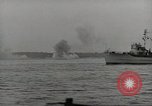 Image of planes dive bombing beach Pacific Theater, 1943, second 34 stock footage video 65675058376