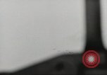 Image of planes dive bombing beach Pacific Theater, 1943, second 44 stock footage video 65675058376
