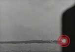 Image of planes dive bombing beach Pacific Theater, 1943, second 52 stock footage video 65675058376
