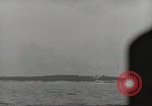 Image of planes dive bombing beach Pacific Theater, 1943, second 54 stock footage video 65675058376