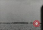 Image of planes dive bombing beach Pacific Theater, 1943, second 58 stock footage video 65675058376