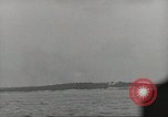 Image of planes dive bombing beach Pacific Theater, 1943, second 62 stock footage video 65675058376
