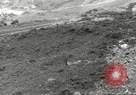 Immagine di Danni da bombardamento giapponese di Harbor olandese Aleutian Islands Alaska USA, 1942, secondo 3 filmato di repertorio 65675058382