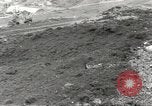 Immagine di Danni da bombardamento giapponese di Harbor olandese Aleutian Islands Alaska USA, 1942, secondo 4 filmato di repertorio 65675058382