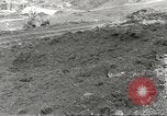 Immagine di Danni da bombardamento giapponese di Harbor olandese Aleutian Islands Alaska USA, 1942, secondo 5 filmato di repertorio 65675058382