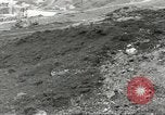 Immagine di Danni da bombardamento giapponese di Harbor olandese Aleutian Islands Alaska USA, 1942, secondo 8 filmato di repertorio 65675058382