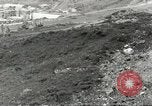 Immagine di Danni da bombardamento giapponese di Harbor olandese Aleutian Islands Alaska USA, 1942, secondo 9 filmato di repertorio 65675058382