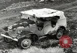 Immagine di Danni da bombardamento giapponese di Harbor olandese Aleutian Islands Alaska USA, 1942, secondo 12 filmato di repertorio 65675058382