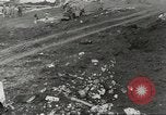 Immagine di Danni da bombardamento giapponese di Harbor olandese Aleutian Islands Alaska USA, 1942, secondo 18 filmato di repertorio 65675058382