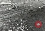 Immagine di Danni da bombardamento giapponese di Harbor olandese Aleutian Islands Alaska USA, 1942, secondo 19 filmato di repertorio 65675058382