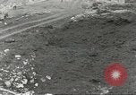 Immagine di Danni da bombardamento giapponese di Harbor olandese Aleutian Islands Alaska USA, 1942, secondo 22 filmato di repertorio 65675058382