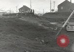 Immagine di Danni da bombardamento giapponese di Harbor olandese Aleutian Islands Alaska USA, 1942, secondo 30 filmato di repertorio 65675058382