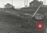 Immagine di Danni da bombardamento giapponese di Harbor olandese Aleutian Islands Alaska USA, 1942, secondo 31 filmato di repertorio 65675058382