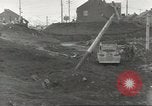 Immagine di Danni da bombardamento giapponese di Harbor olandese Aleutian Islands Alaska USA, 1942, secondo 32 filmato di repertorio 65675058382