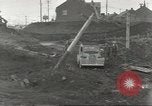 Immagine di Danni da bombardamento giapponese di Harbor olandese Aleutian Islands Alaska USA, 1942, secondo 33 filmato di repertorio 65675058382