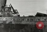 Immagine di Danni da bombardamento giapponese di Harbor olandese Aleutian Islands Alaska USA, 1942, secondo 38 filmato di repertorio 65675058382