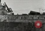 Immagine di Danni da bombardamento giapponese di Harbor olandese Aleutian Islands Alaska USA, 1942, secondo 39 filmato di repertorio 65675058382