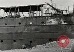 Immagine di Danni da bombardamento giapponese di Harbor olandese Aleutian Islands Alaska USA, 1942, secondo 44 filmato di repertorio 65675058382