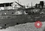 Immagine di Danni da bombardamento giapponese di Harbor olandese Aleutian Islands Alaska USA, 1942, secondo 45 filmato di repertorio 65675058382